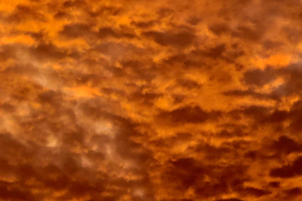 Clouds in shades of warm orange and yellow